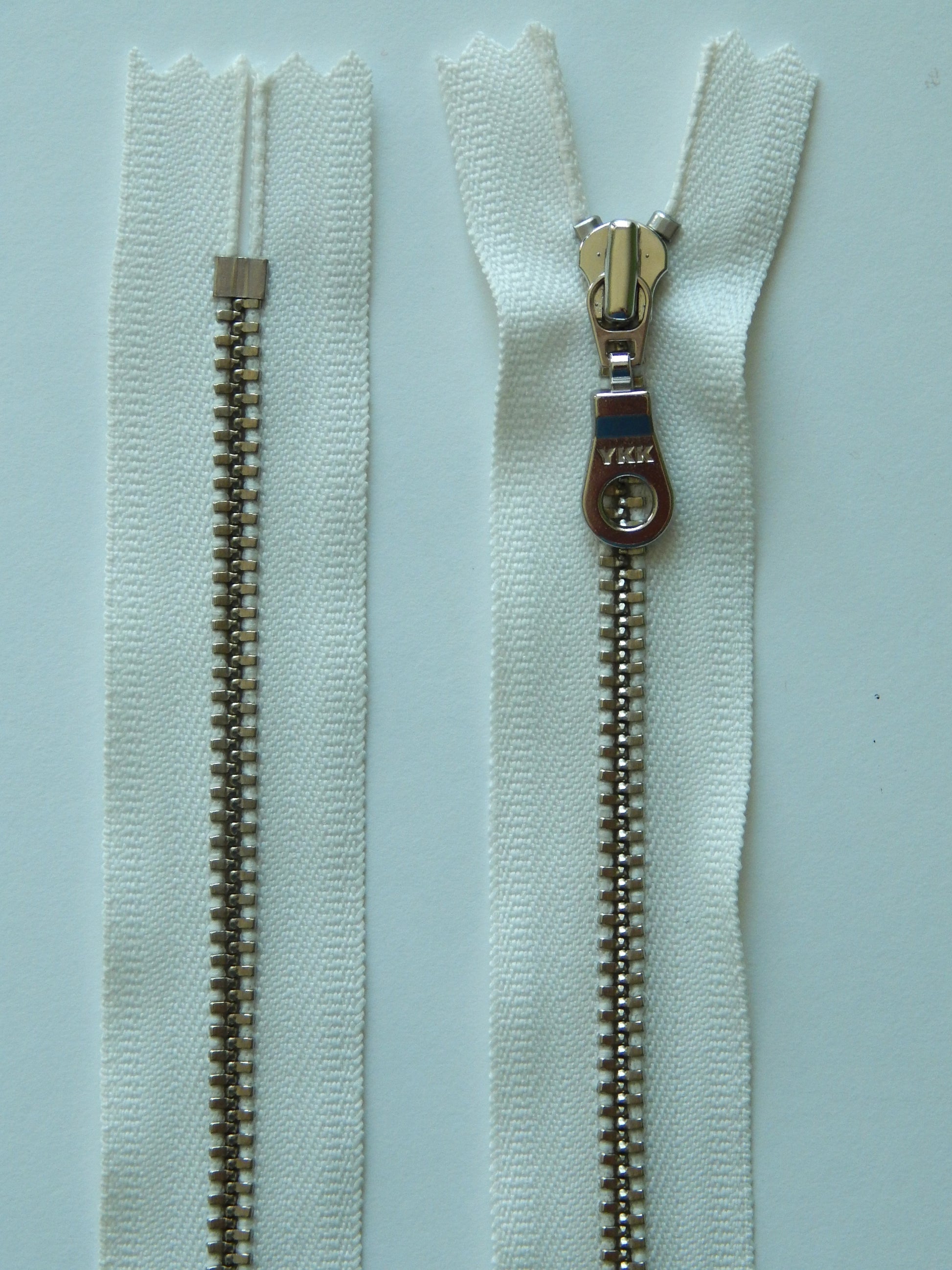 white and silver nonseparating zipper