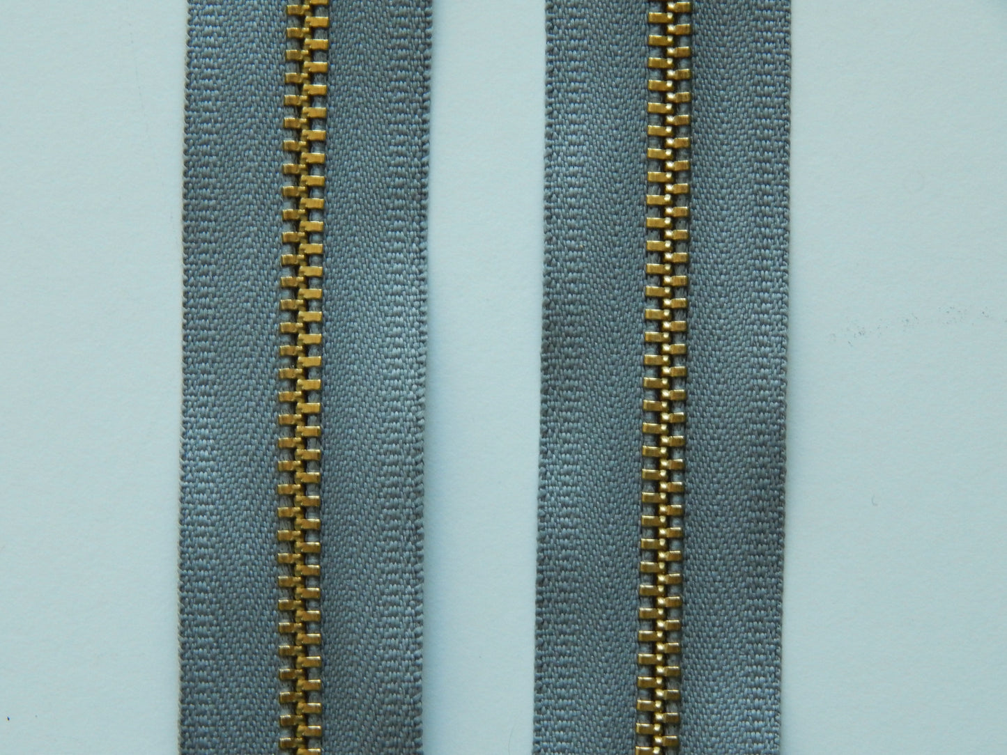 slate grey and bronze zipper