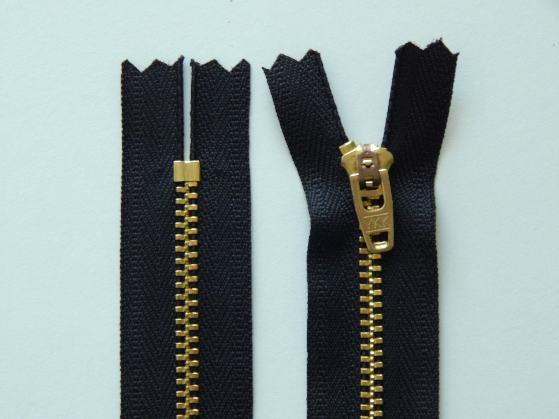 black and brass pant zipper