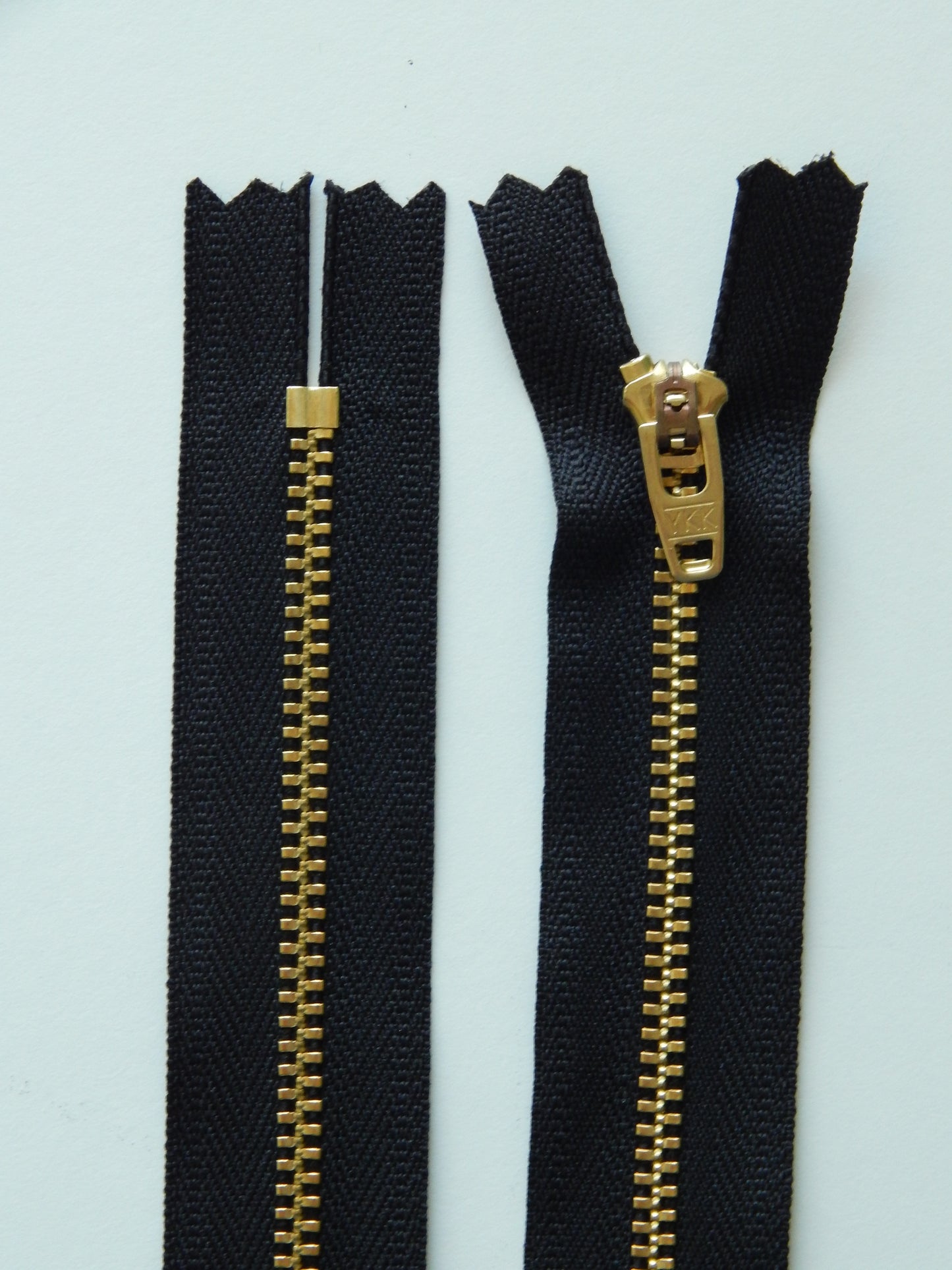 black and brass gold nonseparating pant zipper