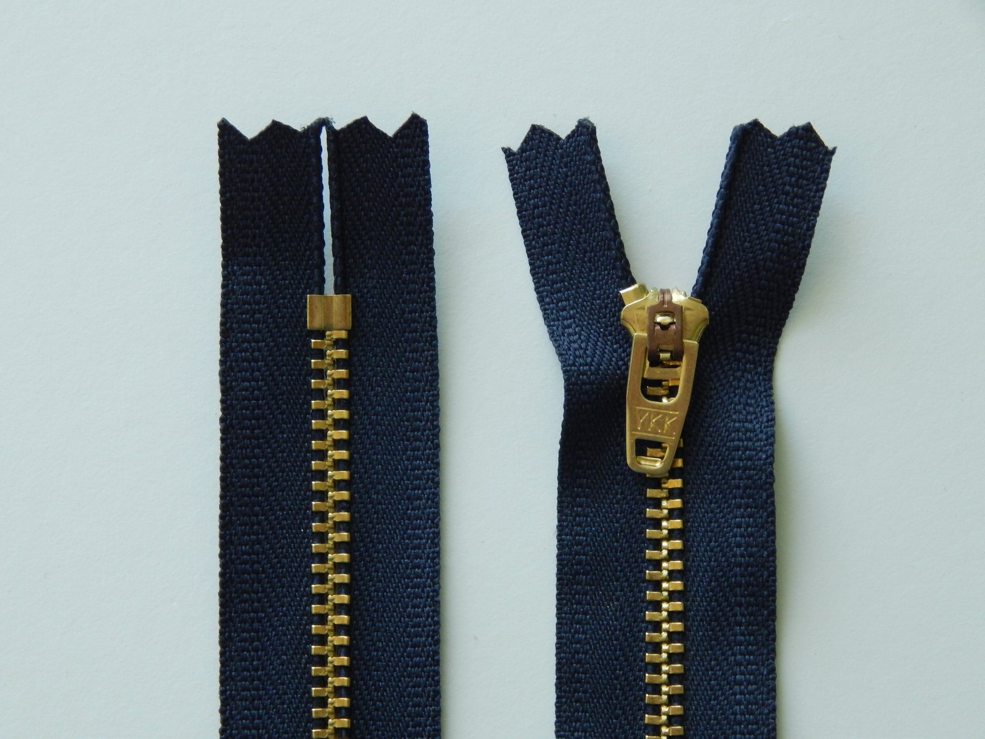 navy and brass pant zipper