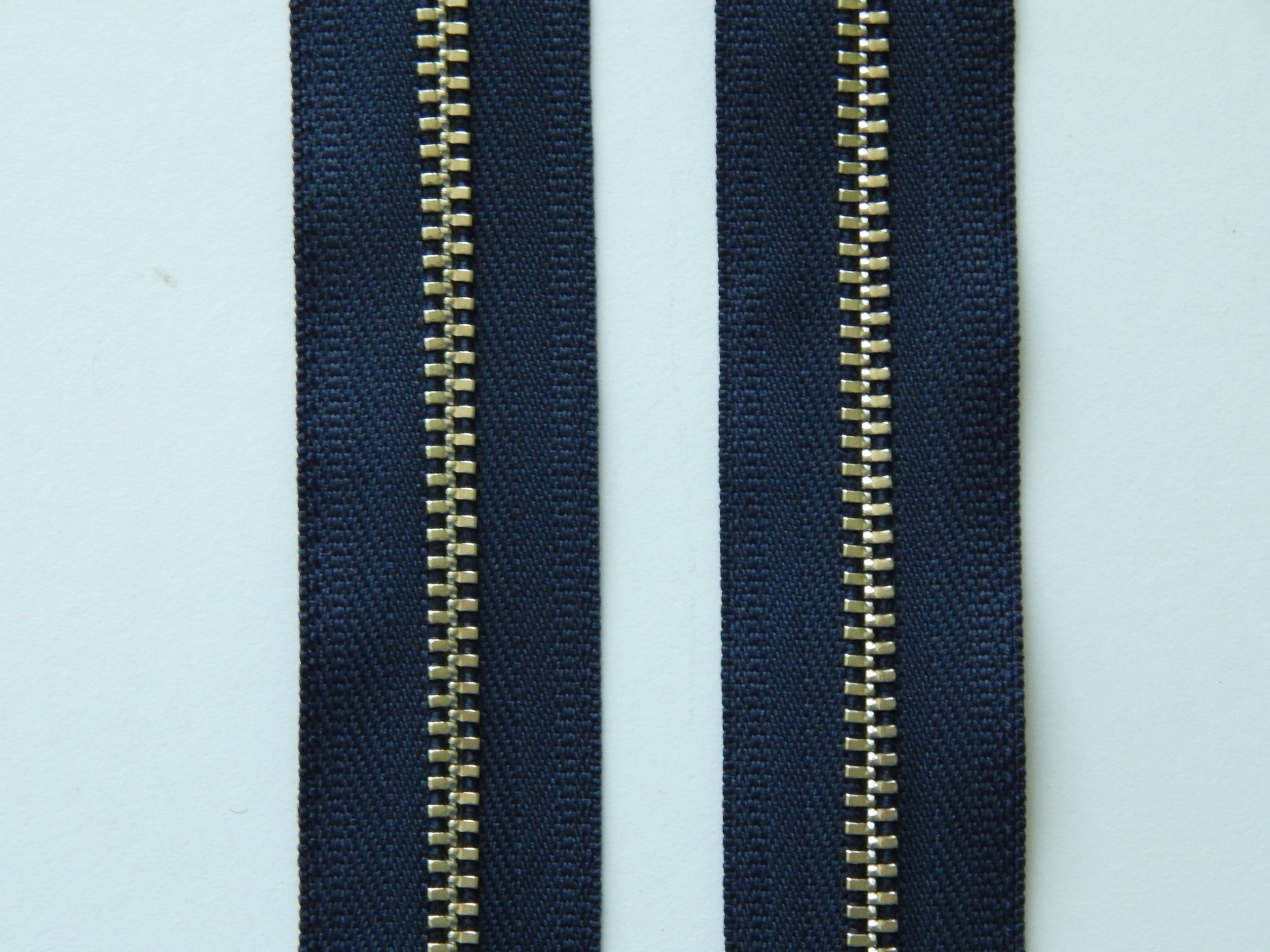 navy blue and nickel zipper
