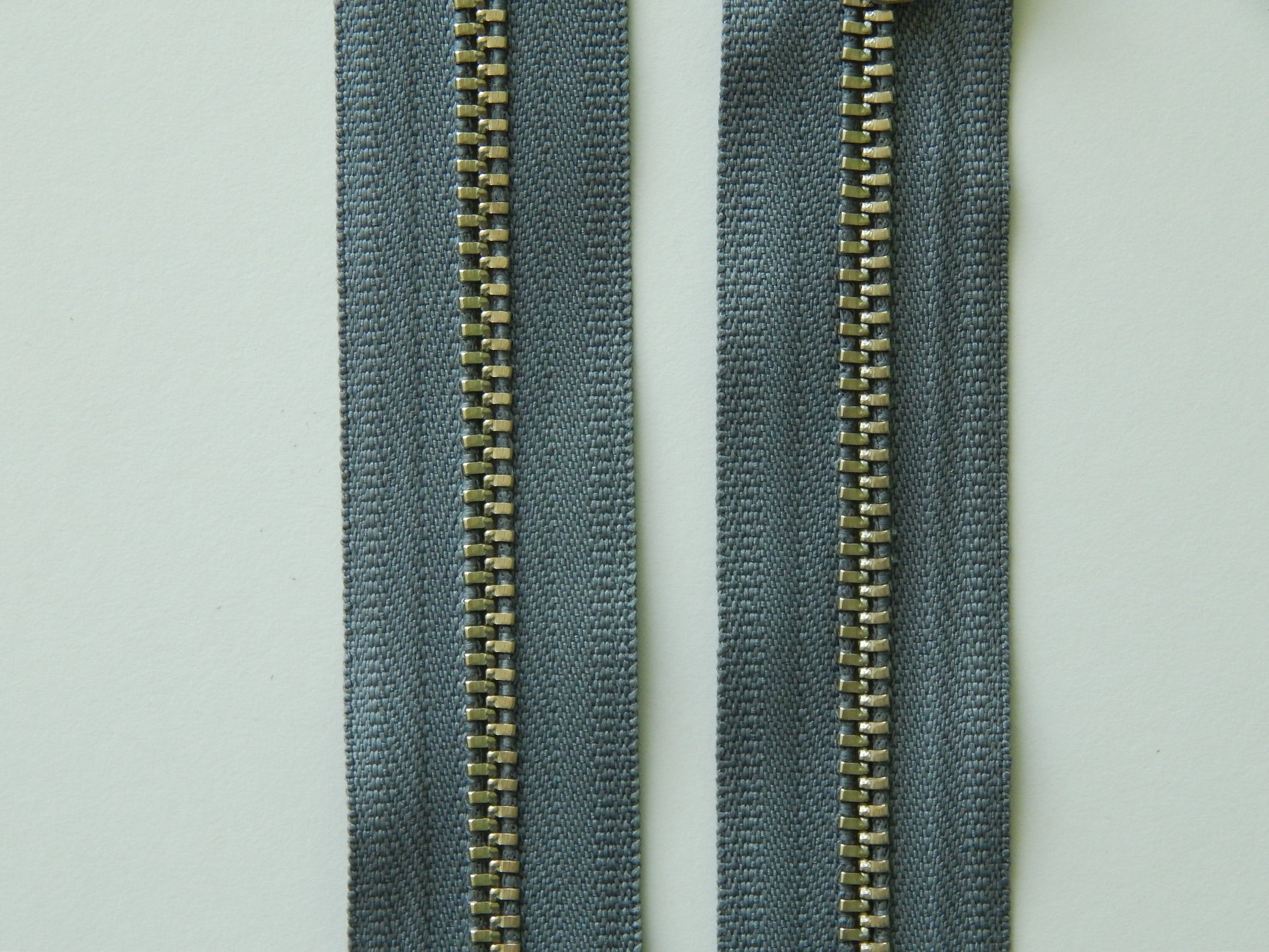 dark grey and nickel zipper