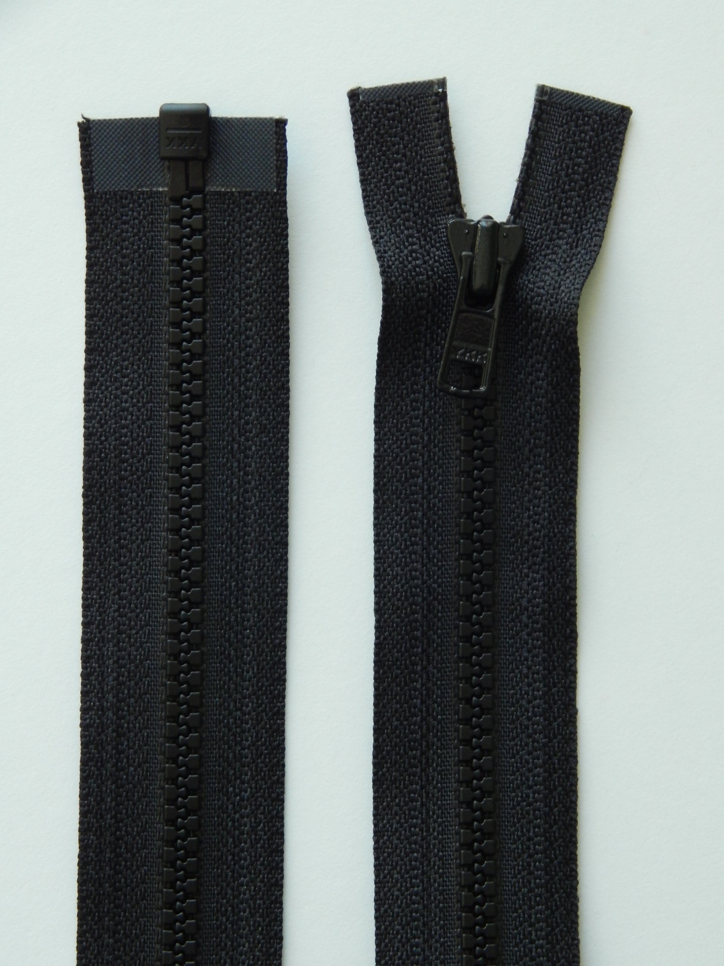 black molded plastic sport separating jacket zipper
