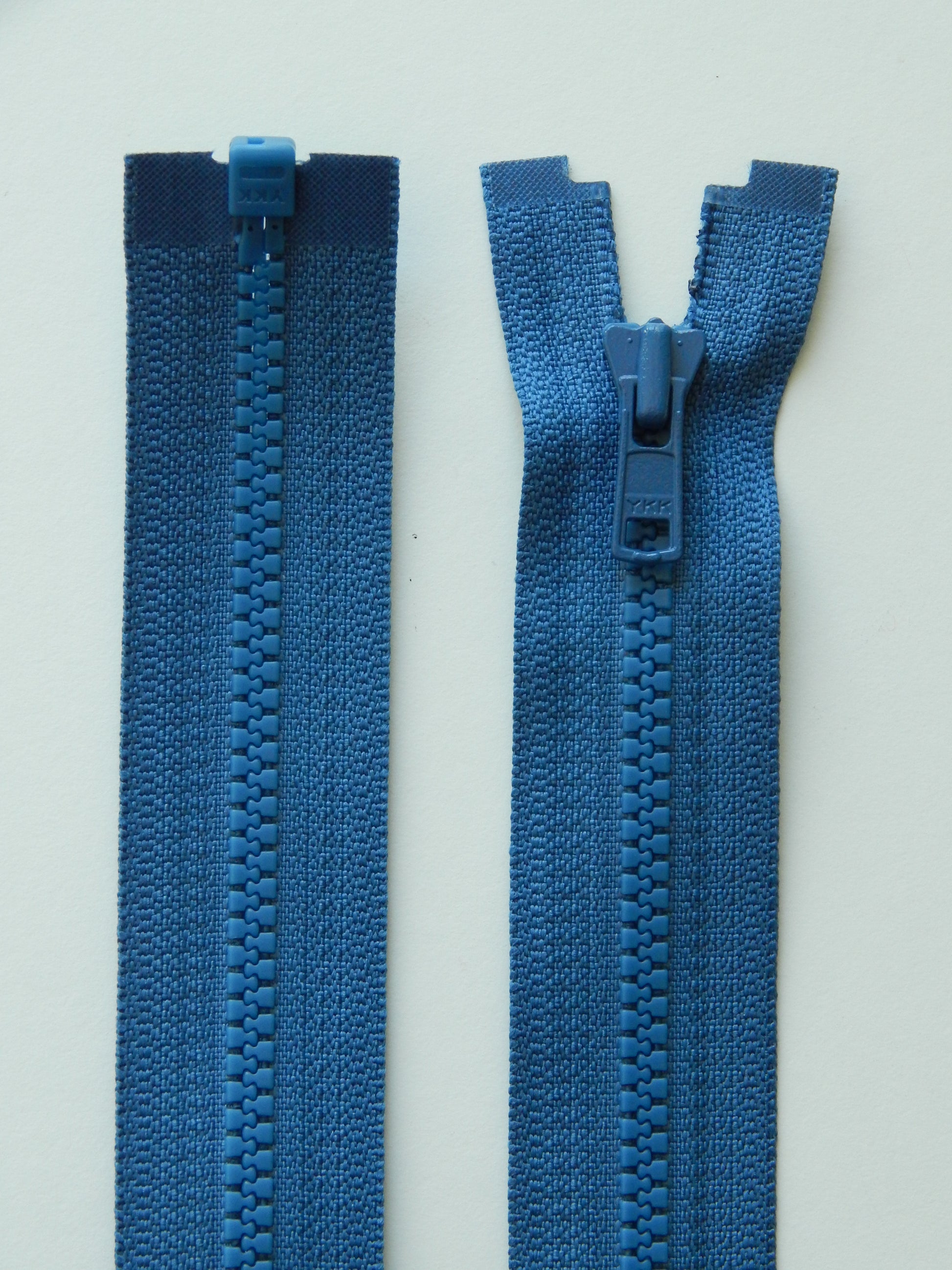 medium blue molded plastic sport separating jacket zipper