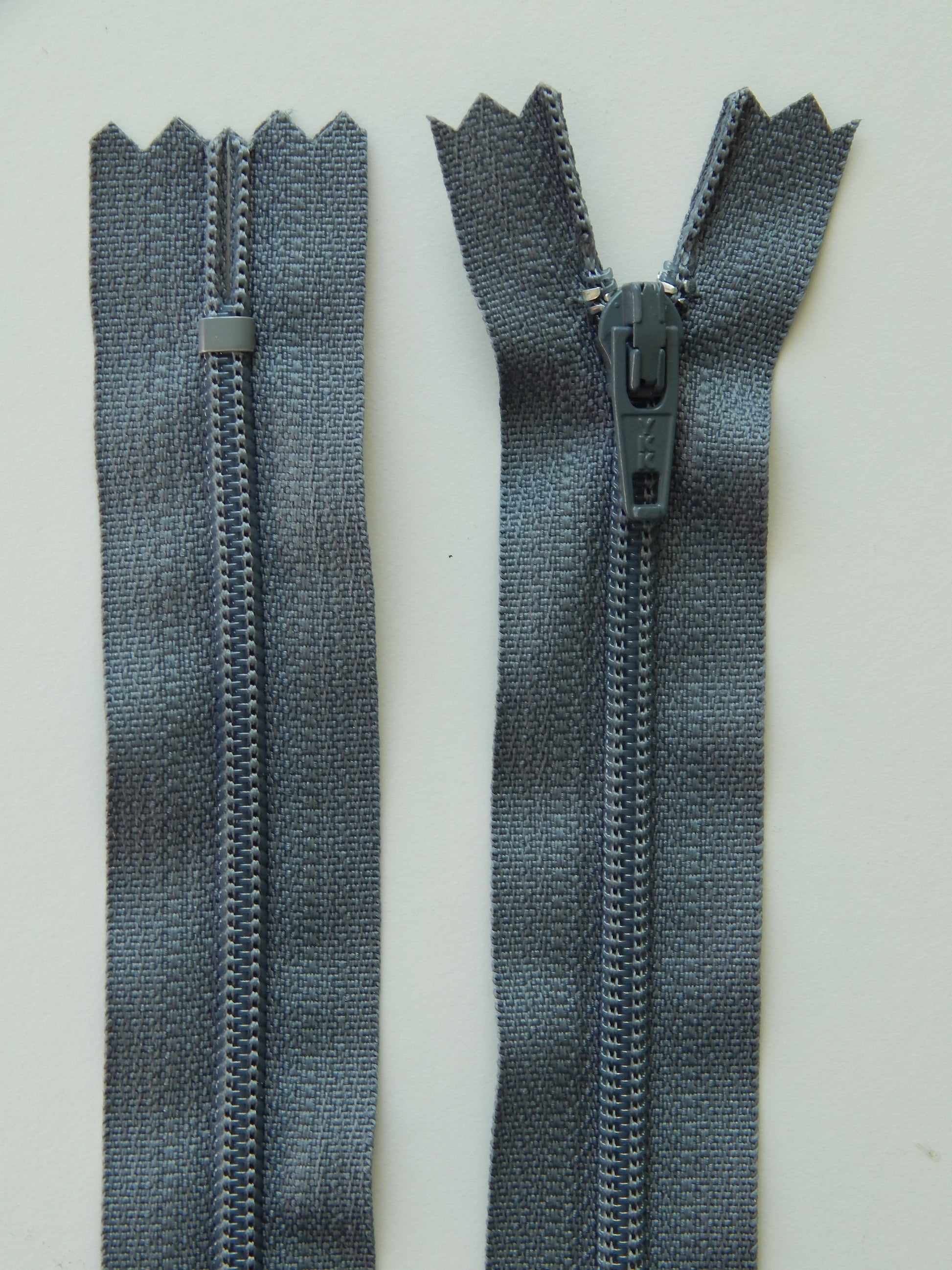 dark gray plastic nonseparating skirt zipper