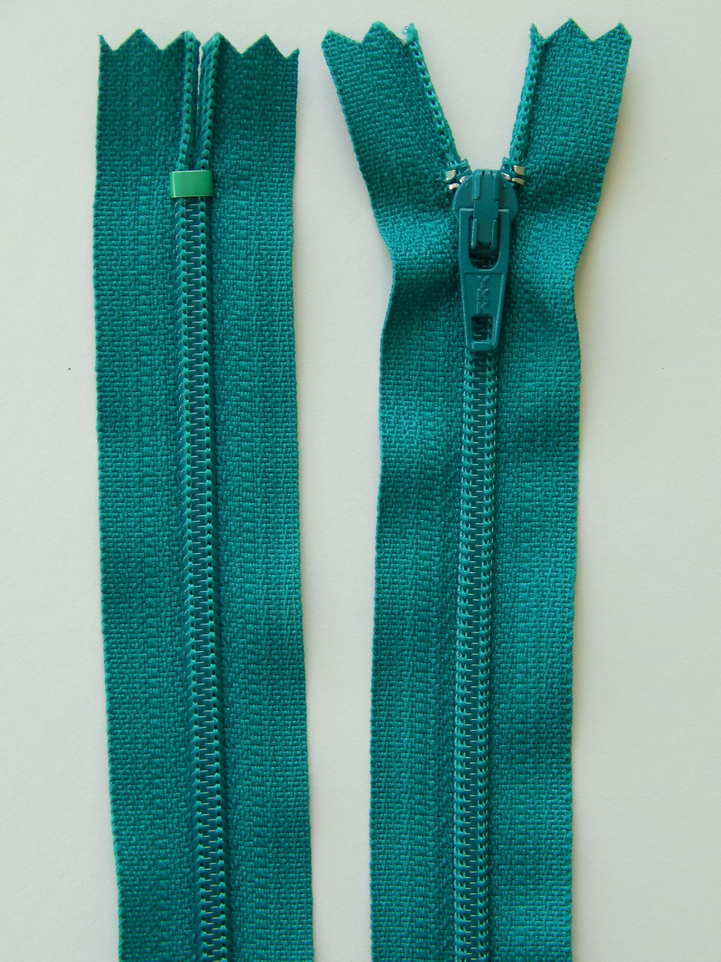 dark turquoise plastic nonseparating zipper