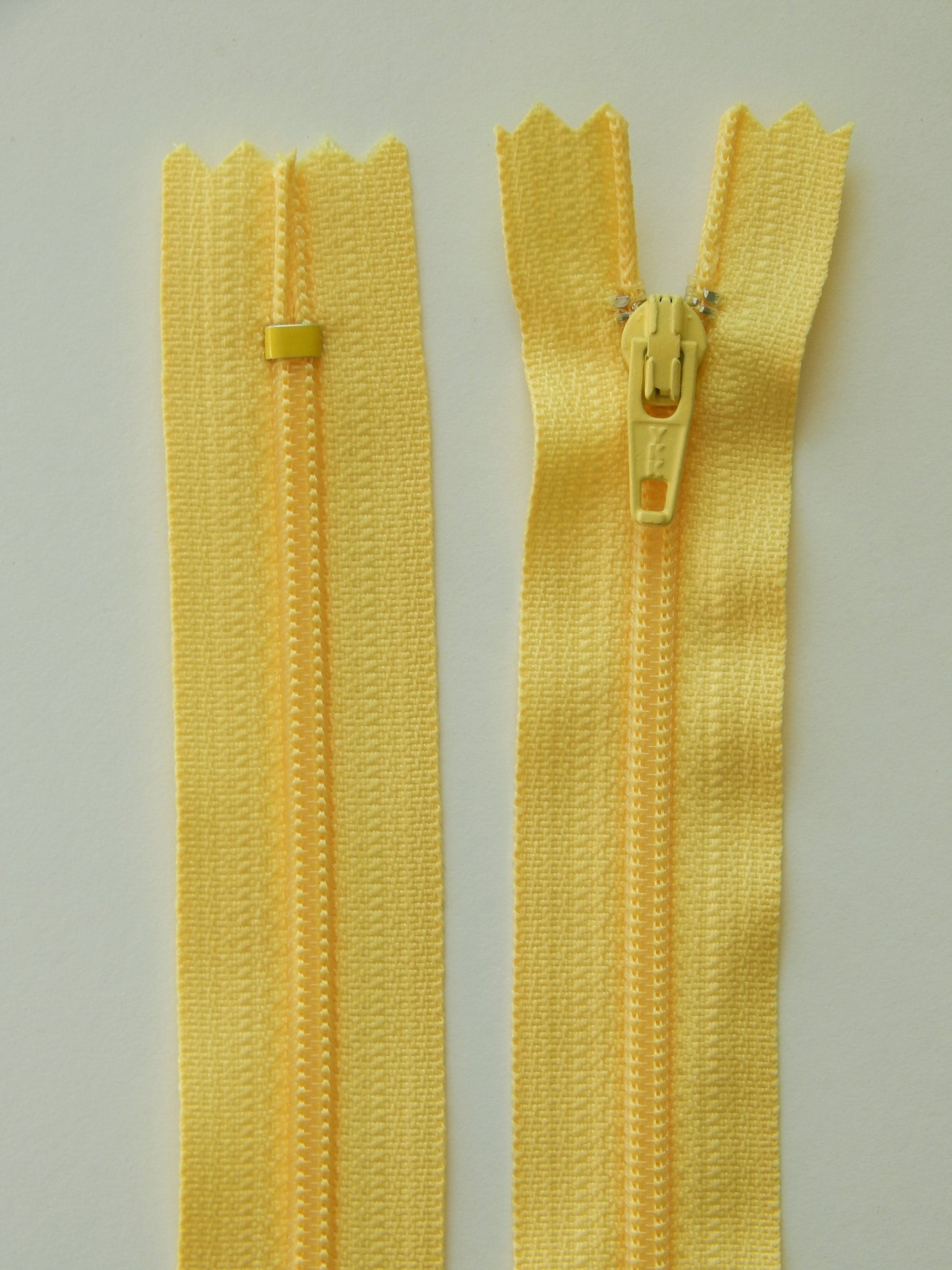 pastel yellow plastic nonseparating skirt zipper