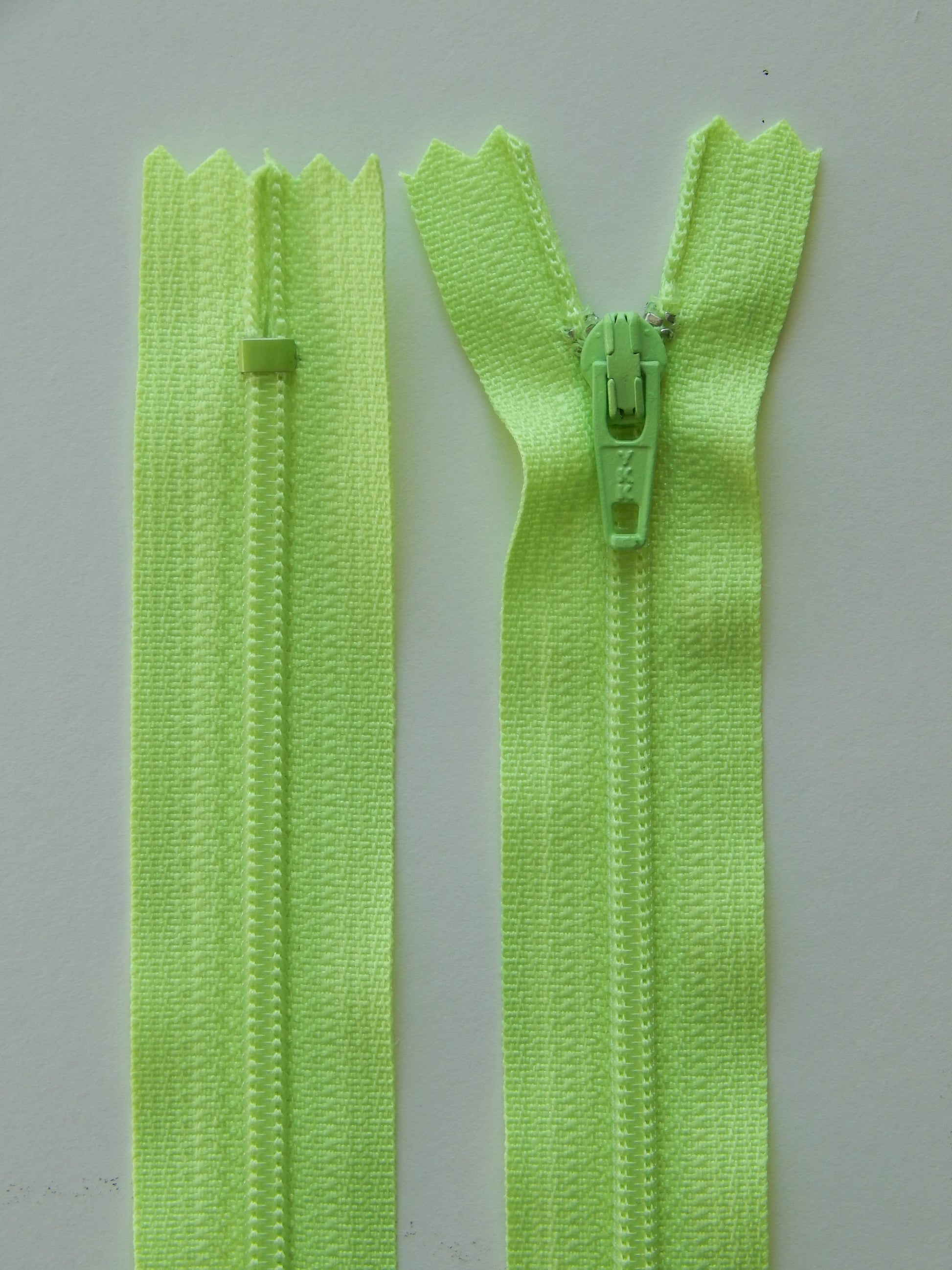 highlighter green plastic nonseparating skirt zipper