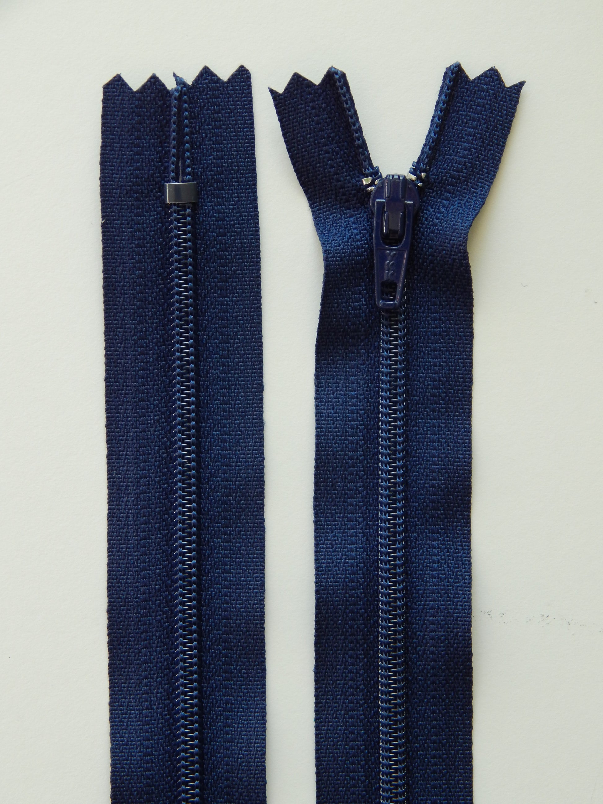 dark blue plastic nonseparating skirt zipper