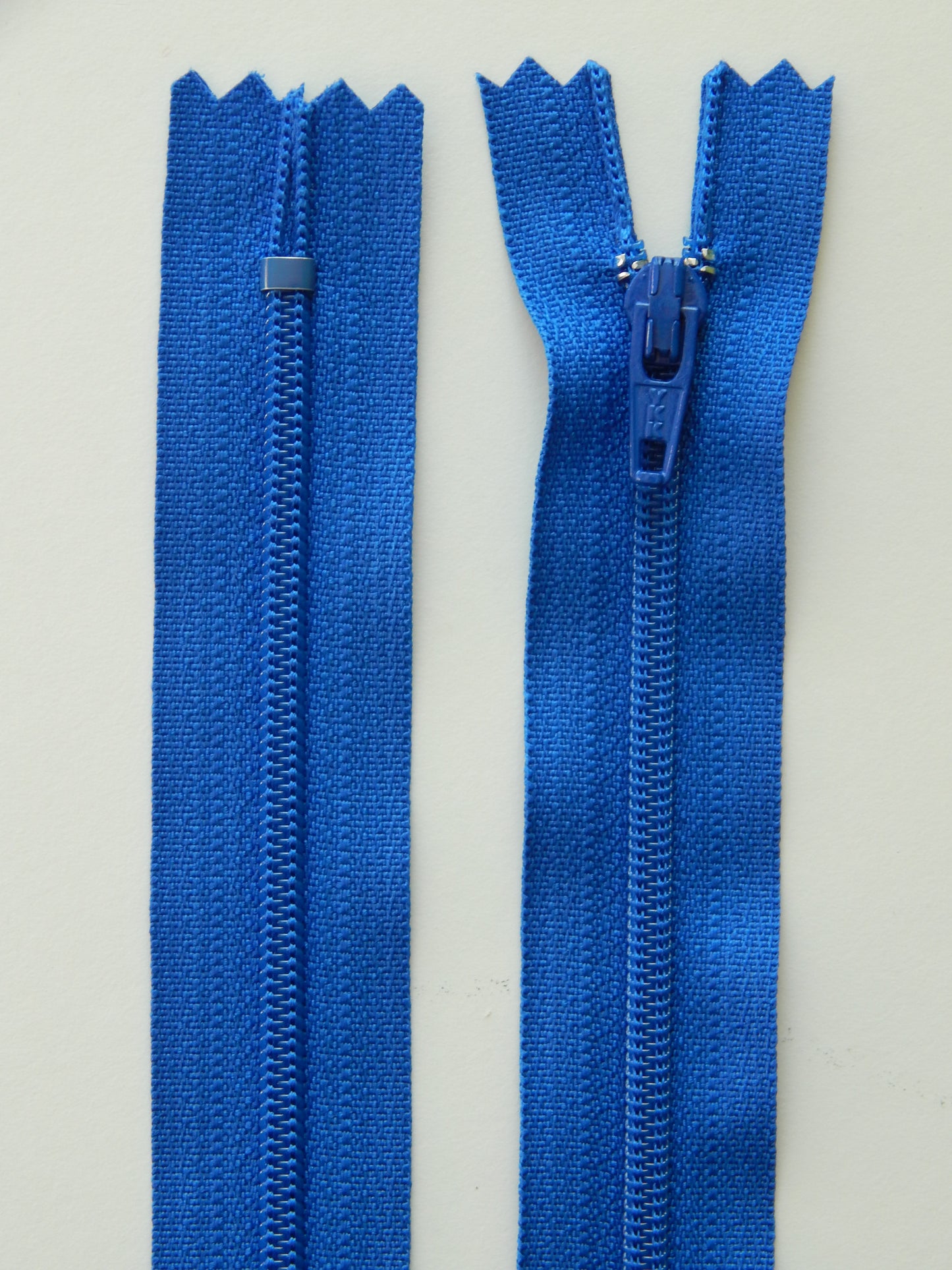 bright blue plastic nonseparating skirt zipper
