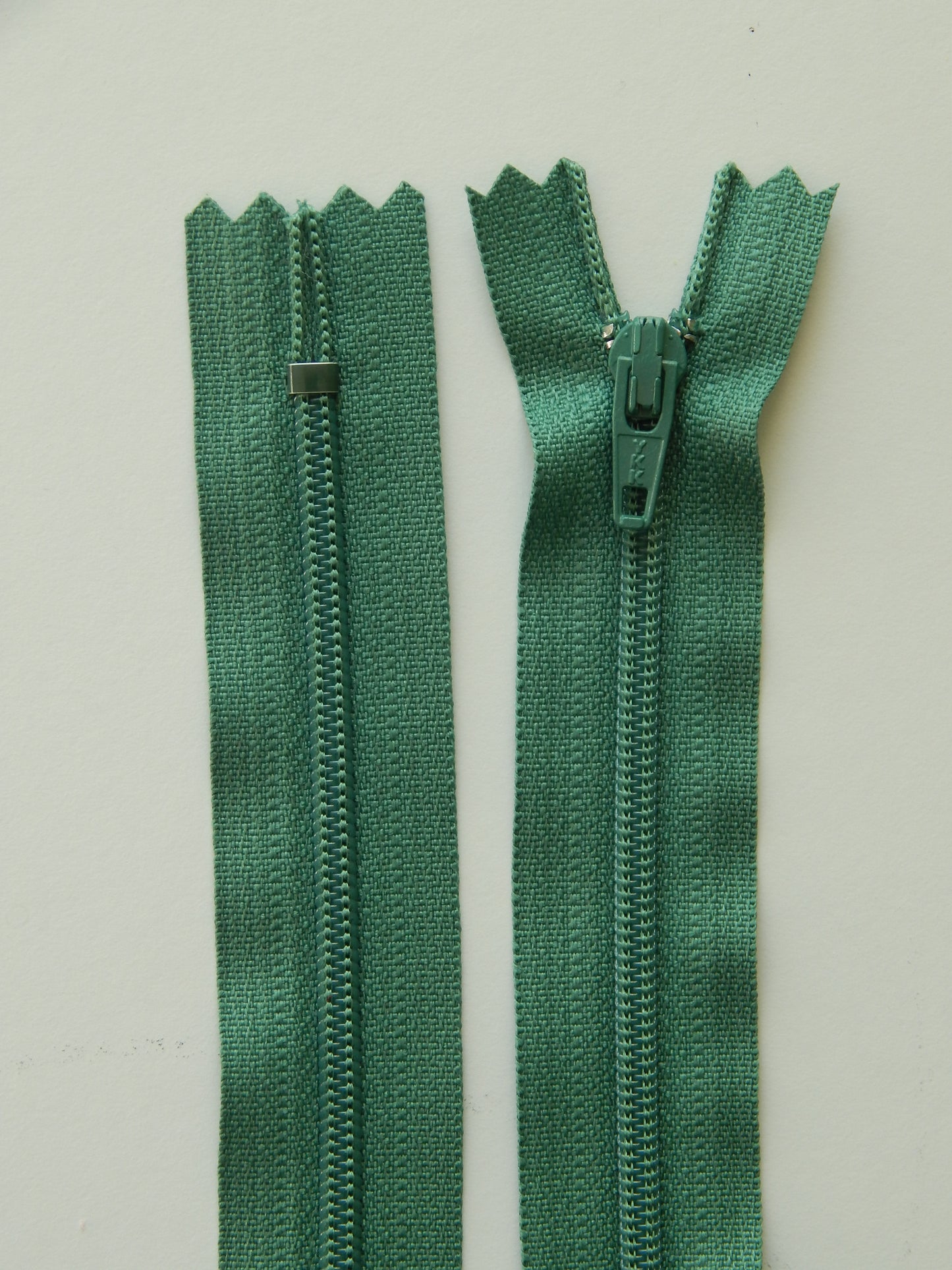 dusty green plastic nonseparating zipper