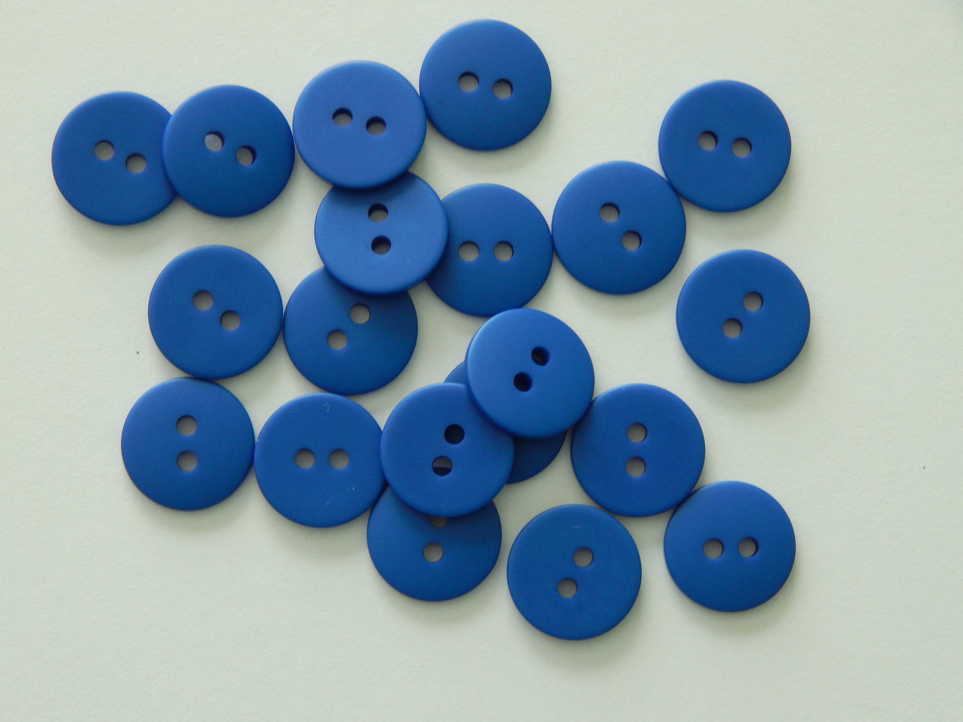blue plastic craft buttons