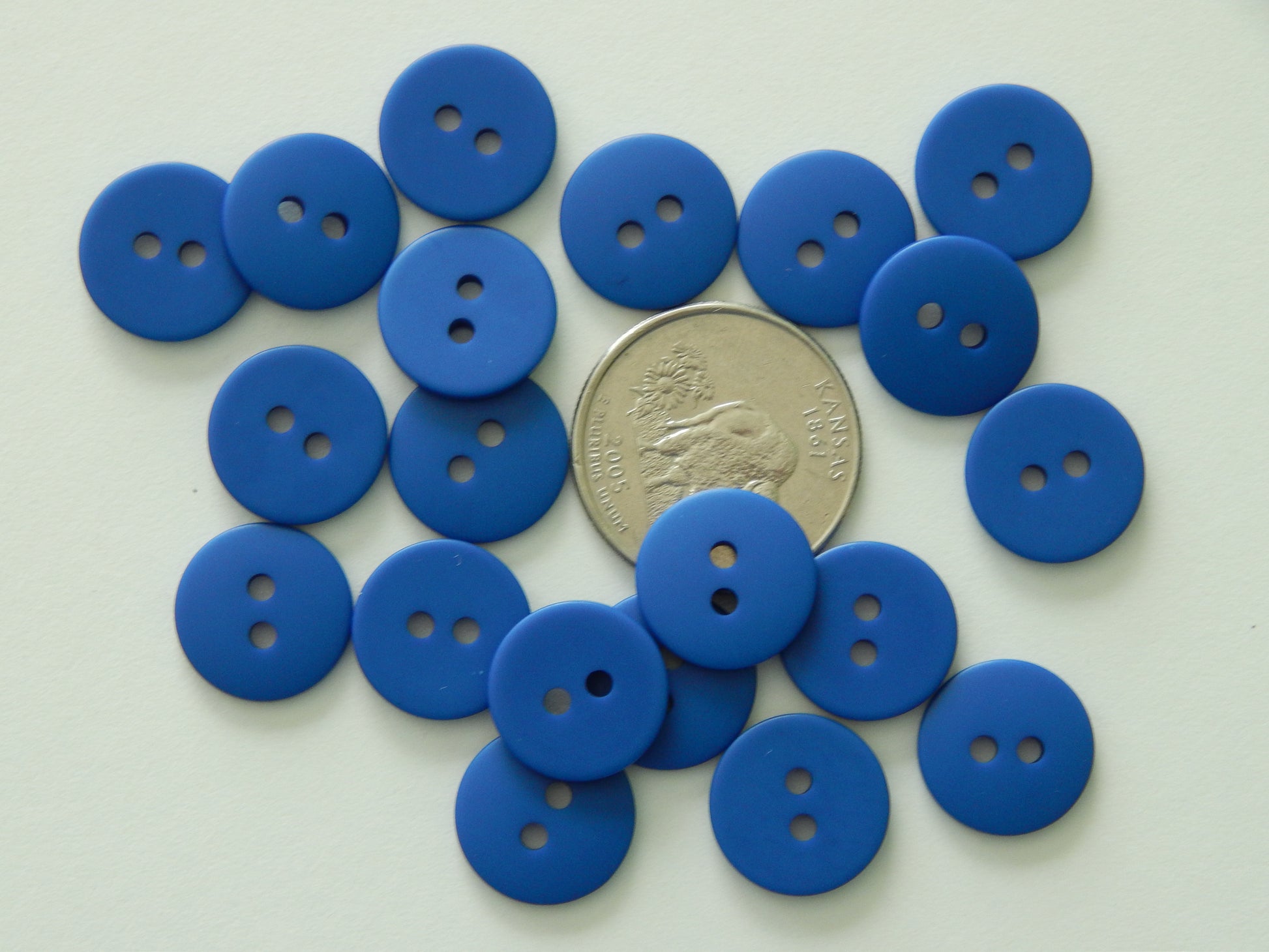 blue kids clothing buttons