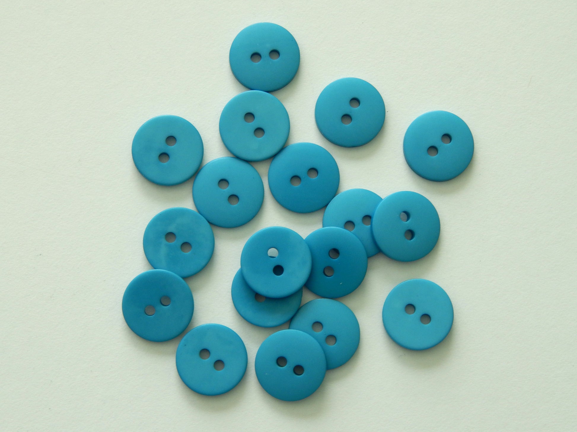 electric blue plastic buttons