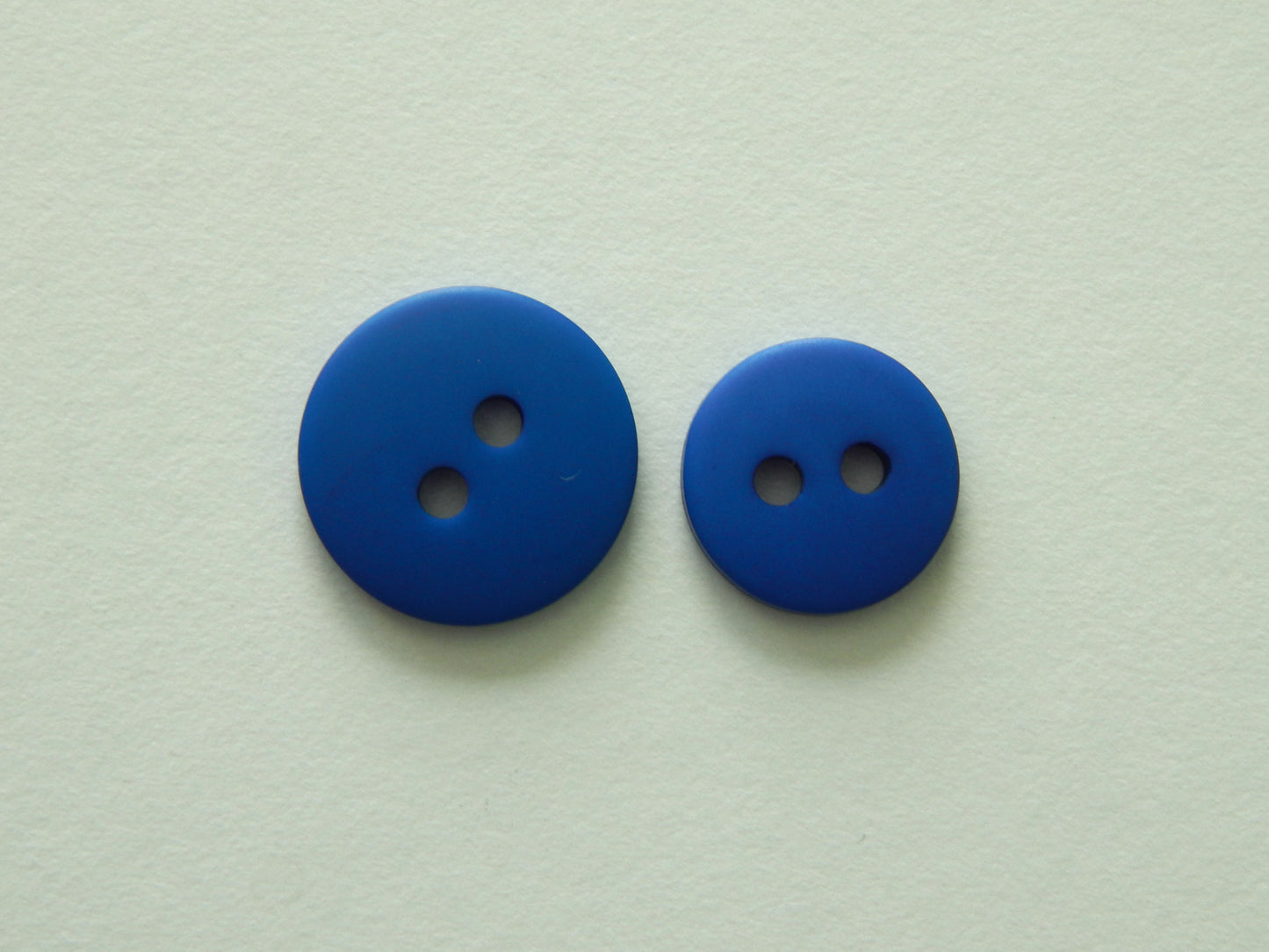 blue plastic buttons