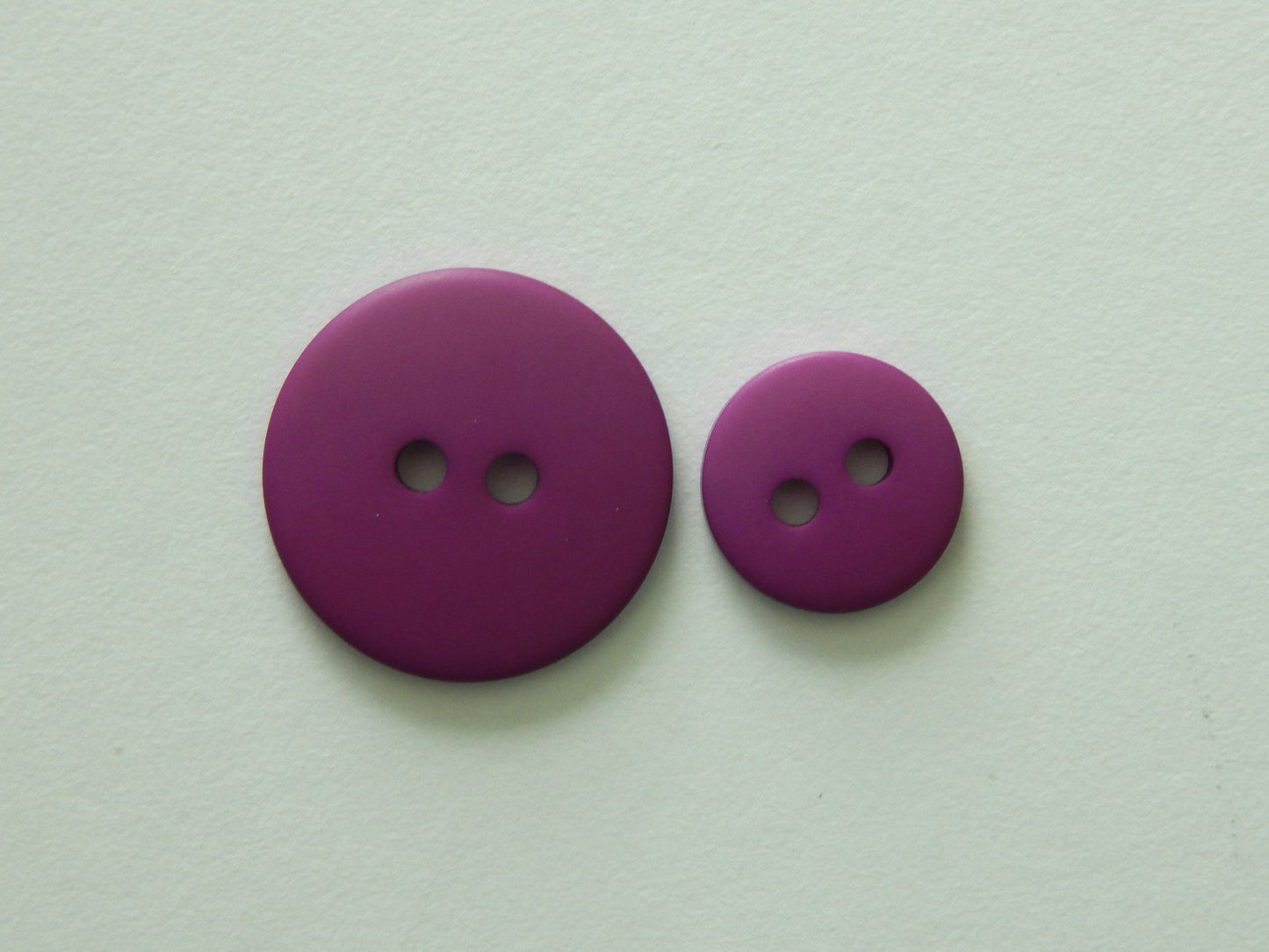 light purple plastic buttons