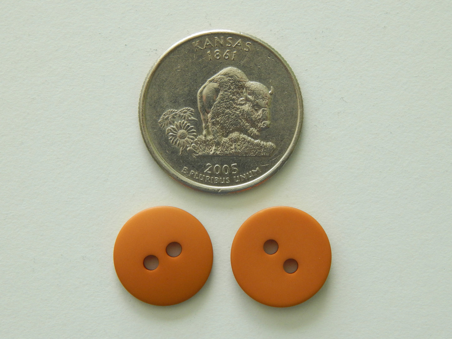 dark gold plastic button