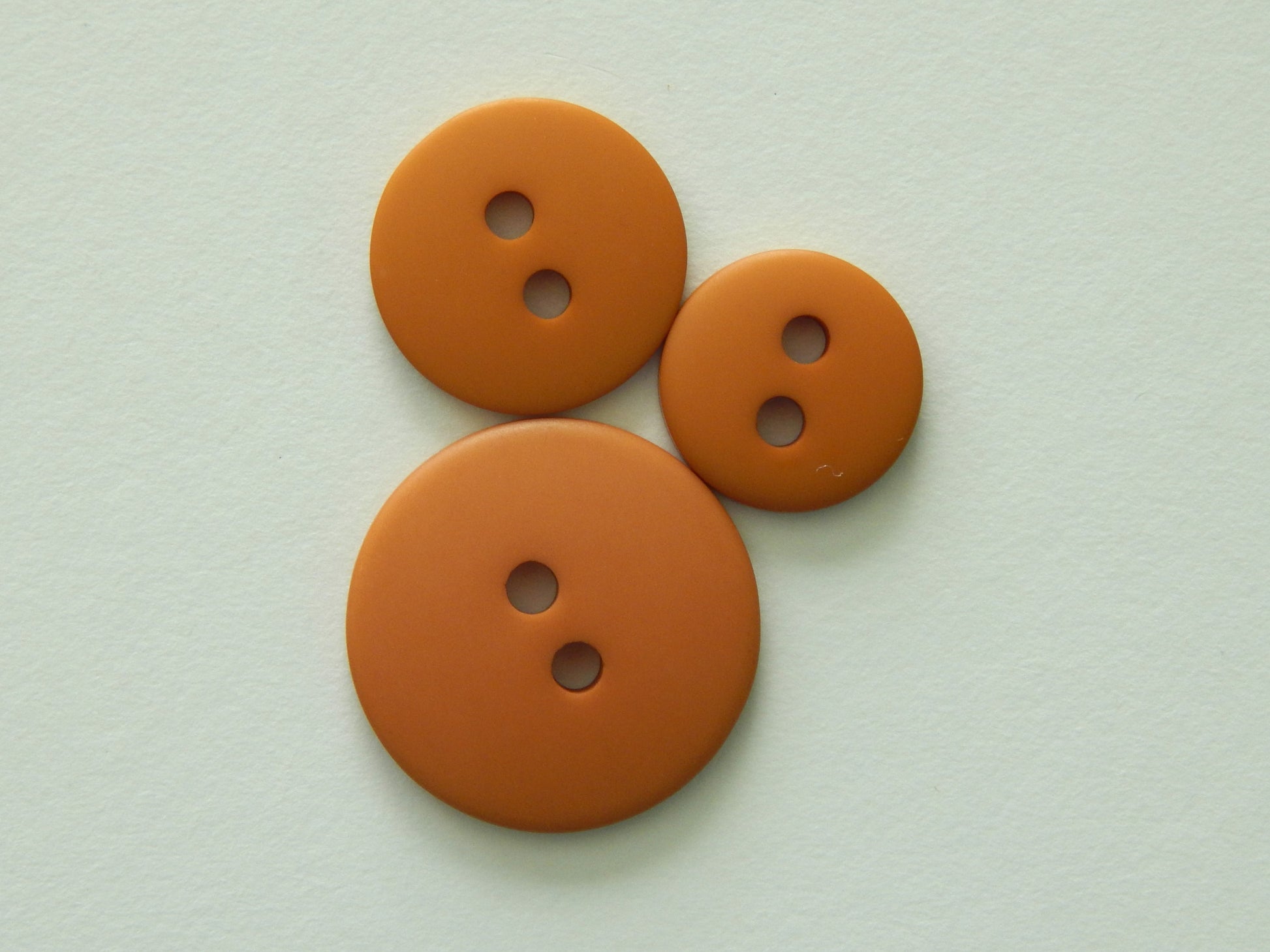 tan shirting buttons