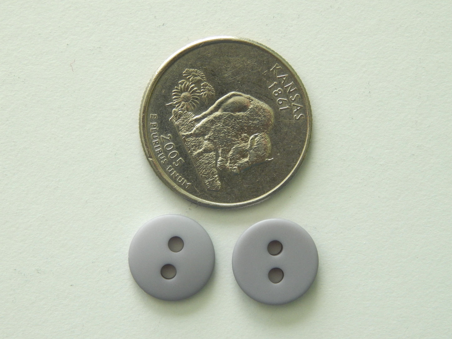 medium gray small plastic buttons