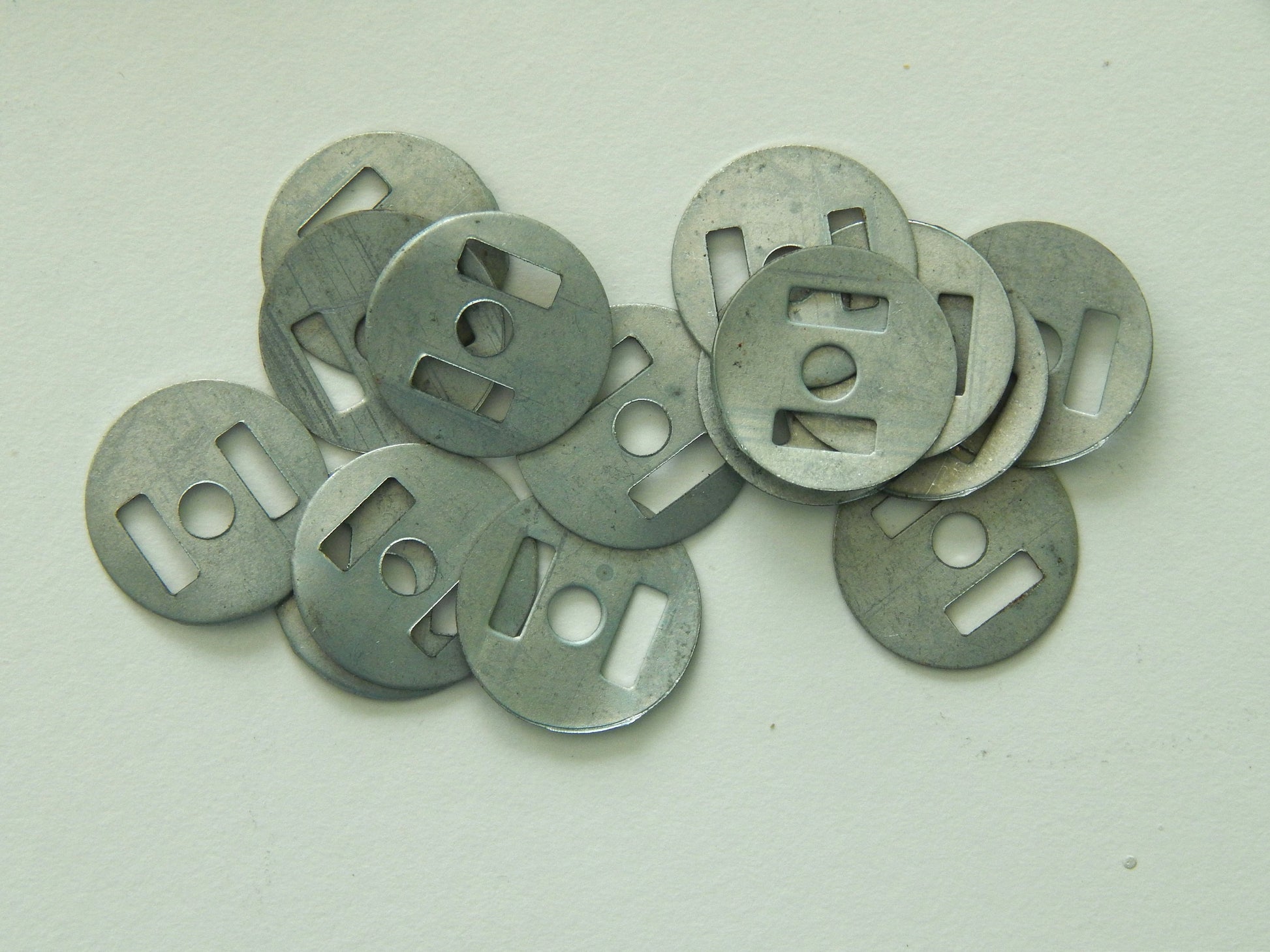 backings for magnetic snaps