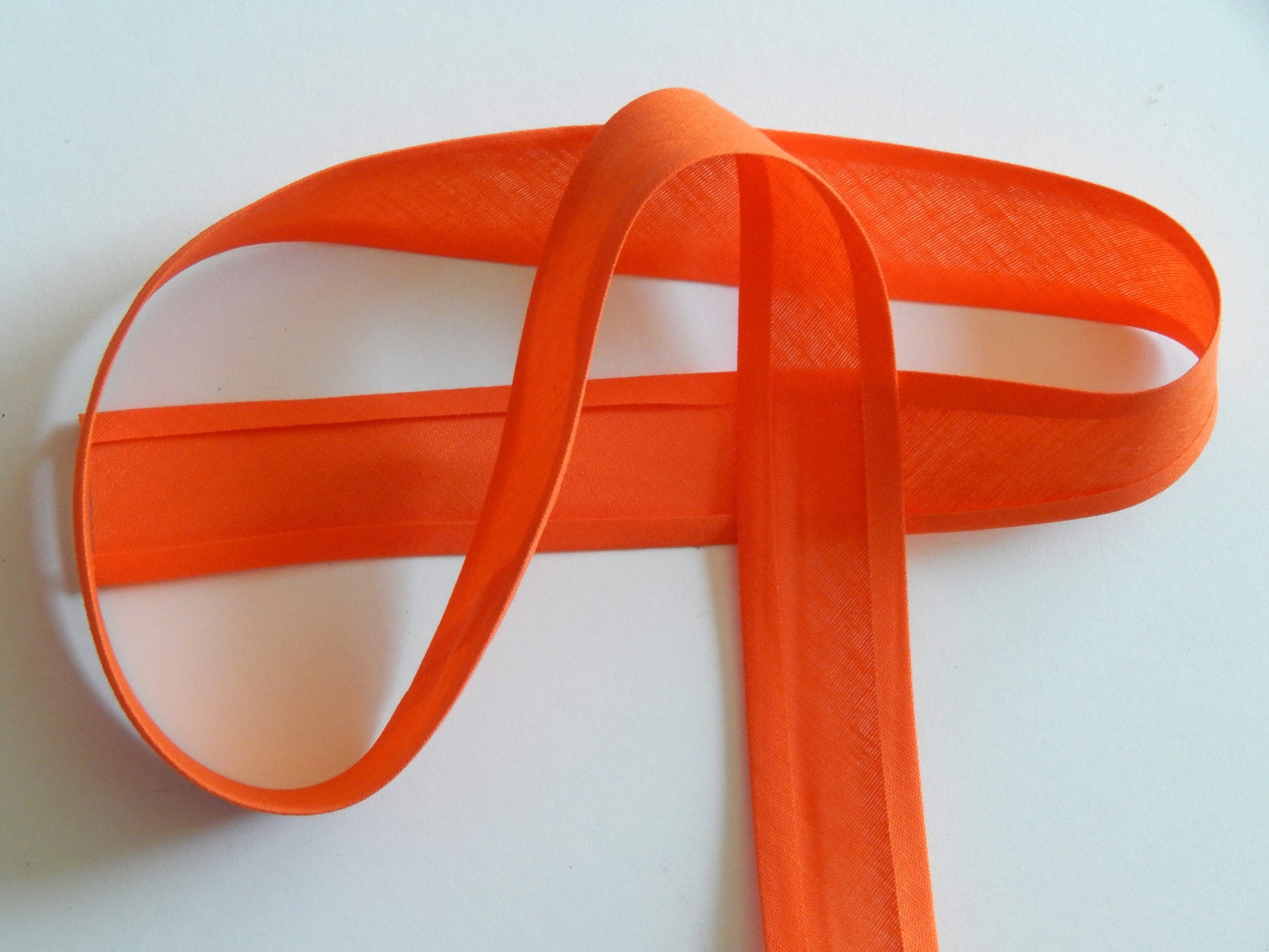 1" cotton and polyester single fold orange bias binding