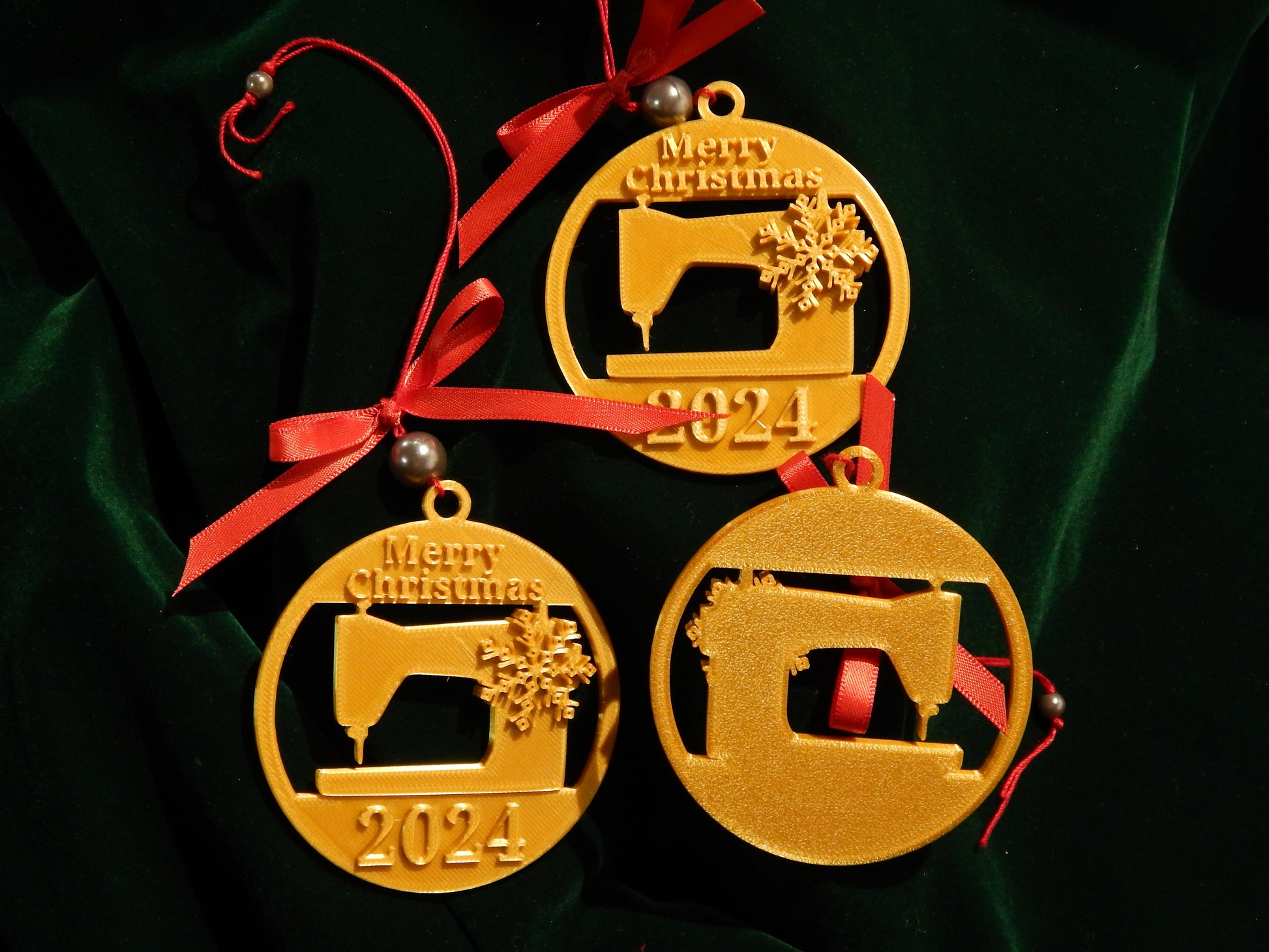 red ribbon and gold sewing ornament