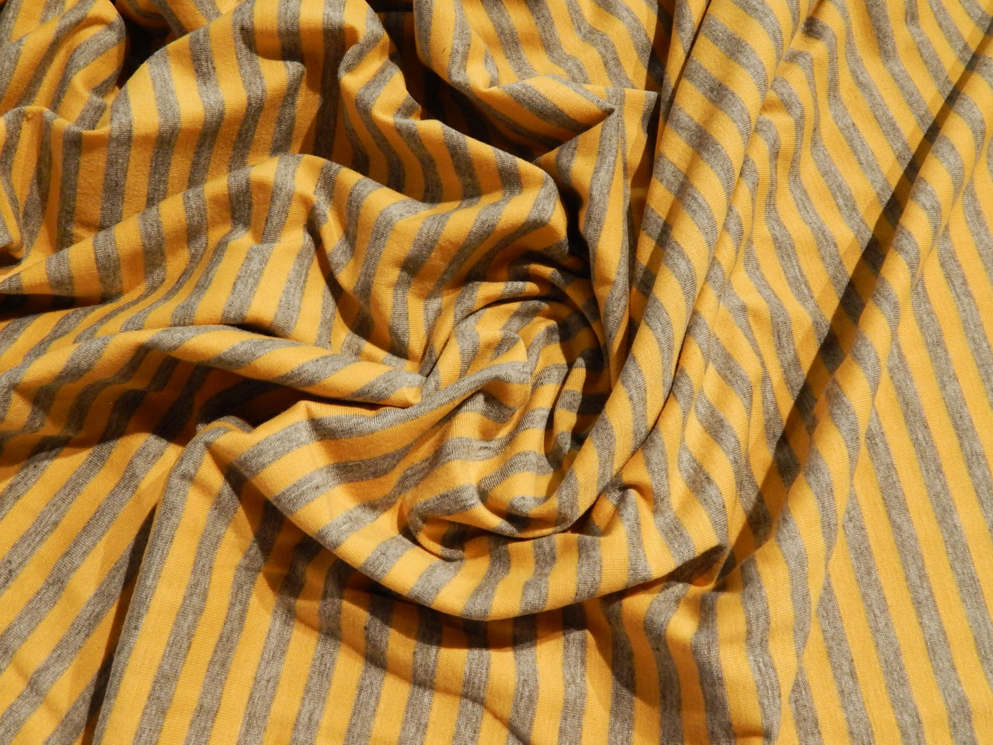 mustard and light gray striped fabric