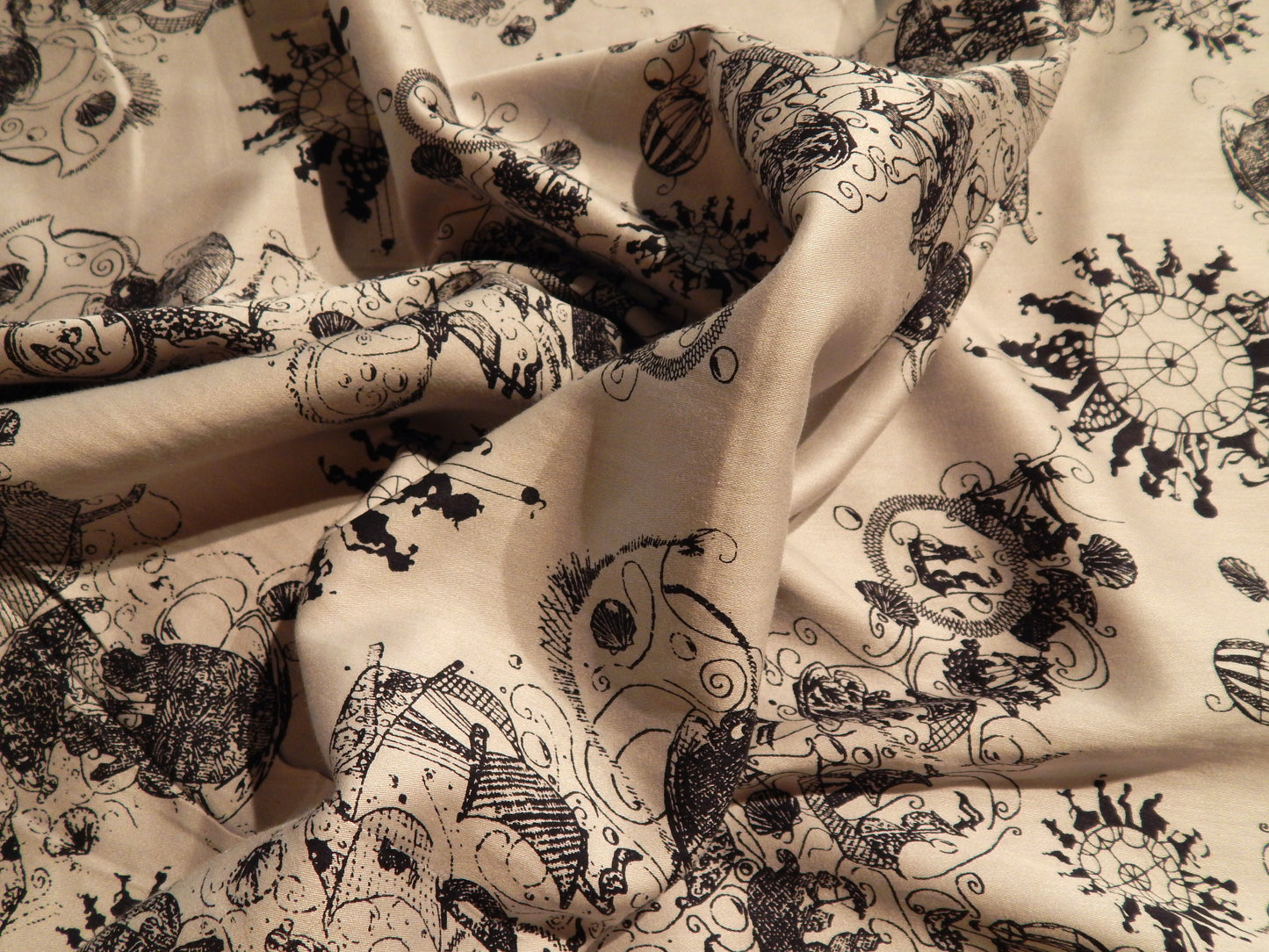 gray and black vintage circus toile cotton lawn fabric