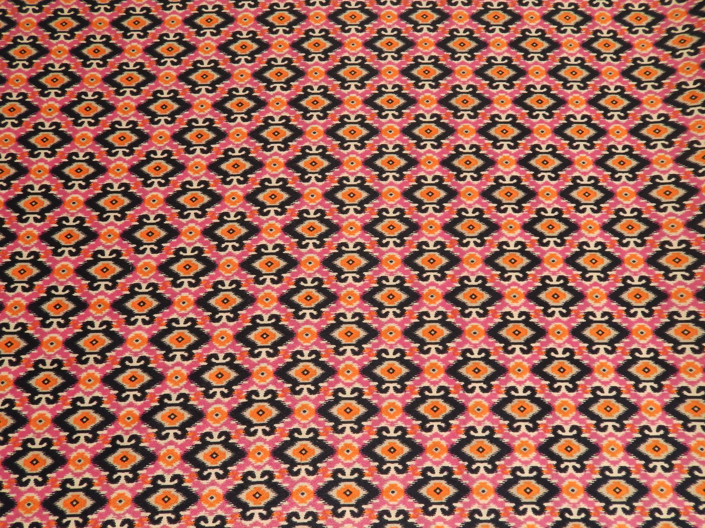 small pink ikat print fabric