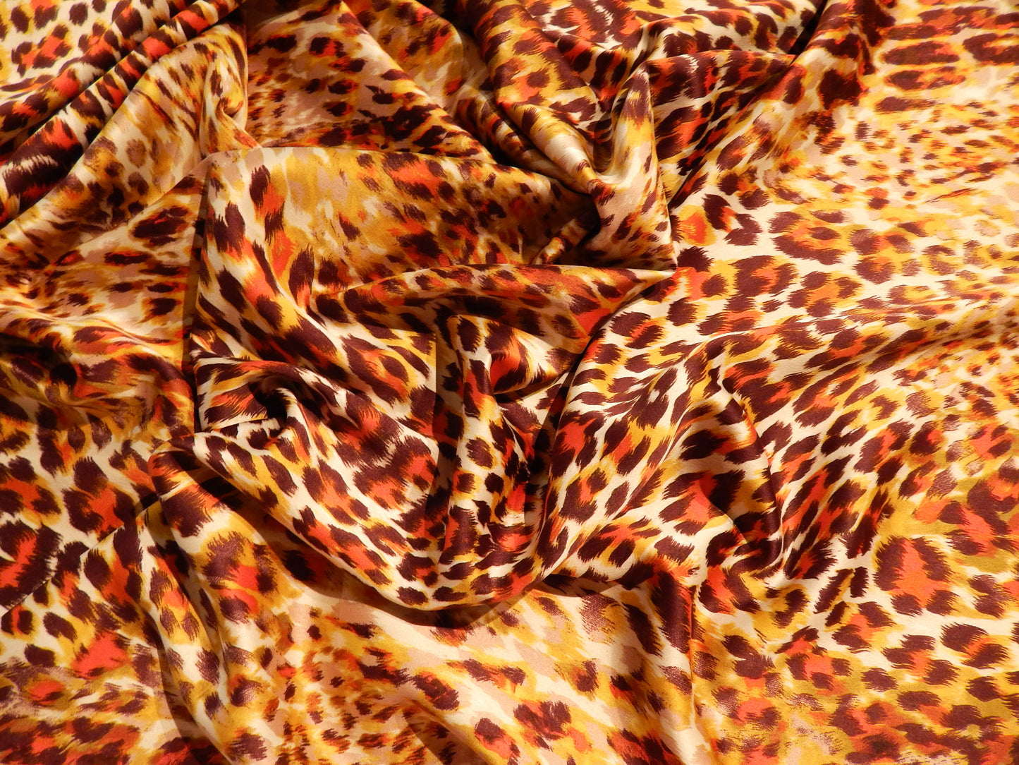 orange and gold cheetah print charmeuse