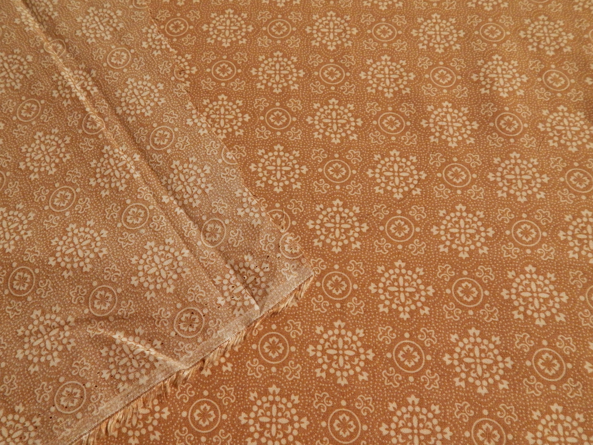 beige and white patterned challis fabric