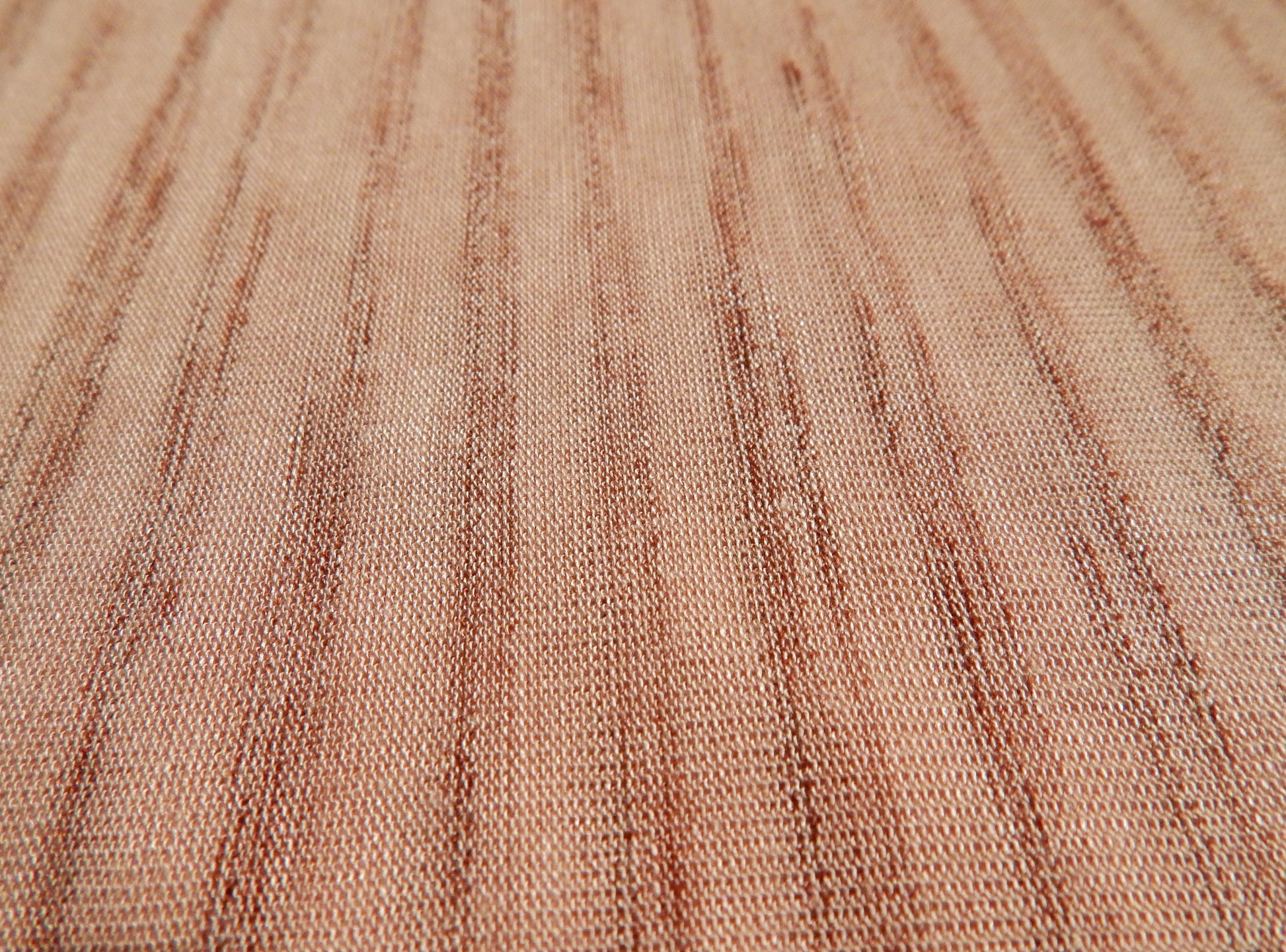 light pink and variegated red striped cotton knit stretch fabric by the yard