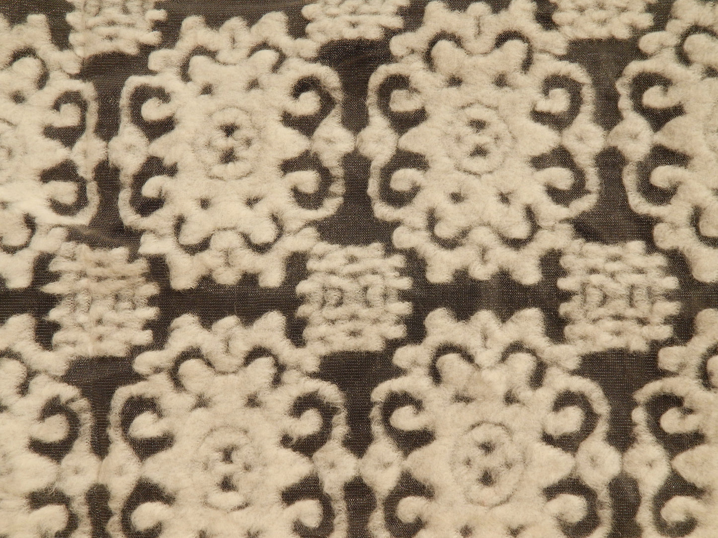 wool motif lace pattern on nylon mesh